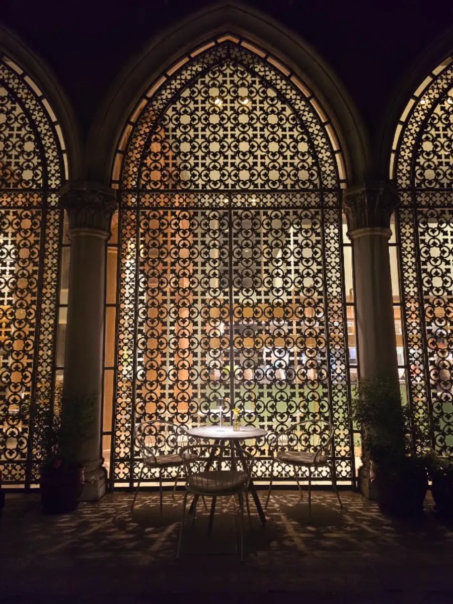 Gothic arches lit at night, Venice